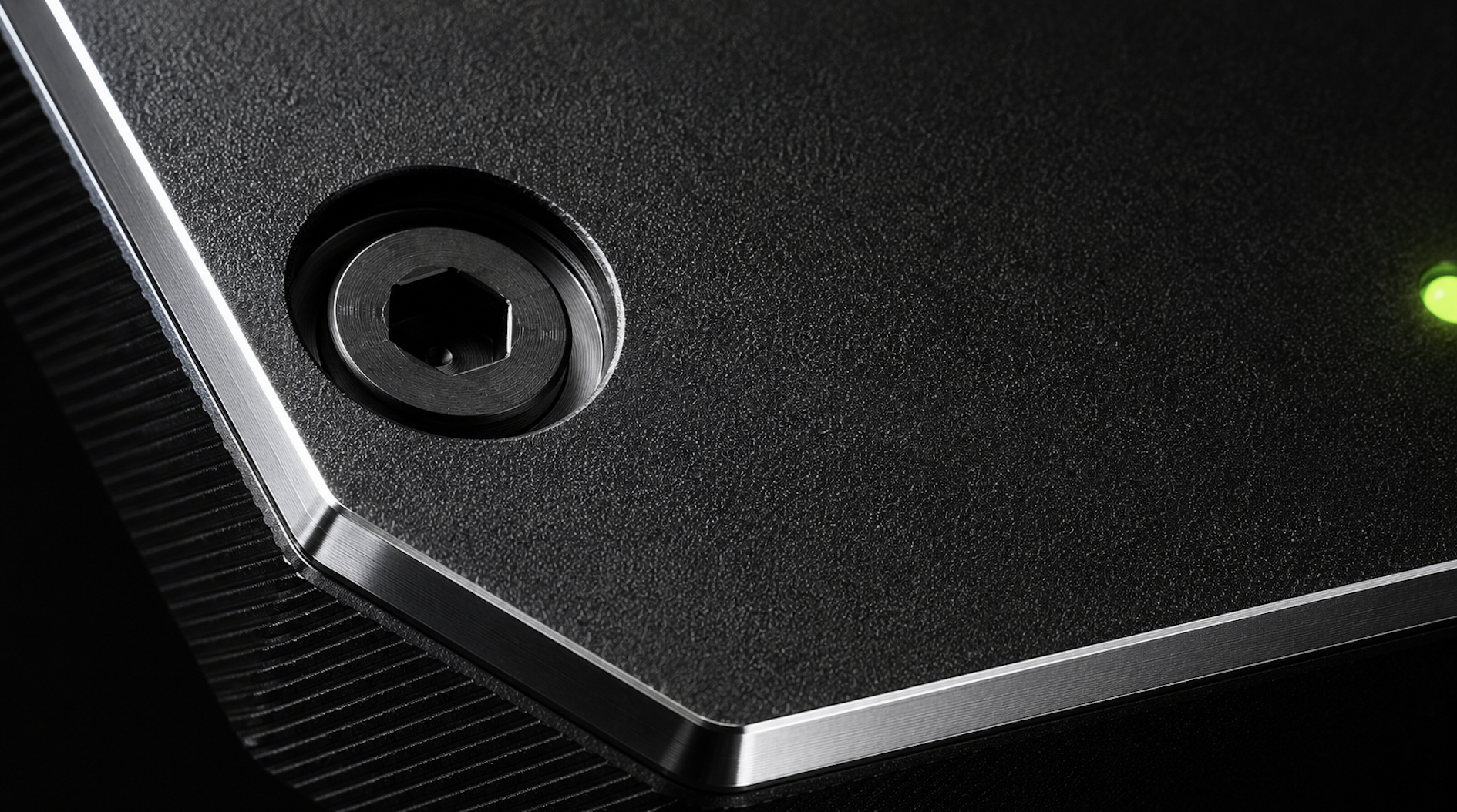 The SparkBit hardware wallet seen from the side, with its display lit.